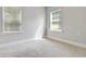 Bright bedroom with neutral walls and plush carpet offers a blank canvas for personal touches at 1405 Attwater Dr, Atlanta, GA 30316