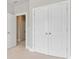 Spacious bedroom featuring closet space and carpet flooring at 1405 Attwater Dr, Atlanta, GA 30316