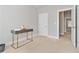 Neutral bedroom with new carpet and access to other rooms in the home at 1405 Attwater Dr, Atlanta, GA 30316