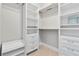 Walk-in closet with adjustable shelving and storage at 1405 Attwater Dr, Atlanta, GA 30316