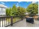 An inviting backyard deck offers outdoor seating with a covered table, ideal for entertaining at 1405 Attwater Dr, Atlanta, GA 30316