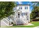 Charming two-story townhome with a welcoming front porch and well-maintained landscaping at 1405 Attwater Dr, Atlanta, GA 30316
