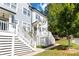 Exterior view of townhome showing siding, stairs, and landscaping at 1405 Attwater Dr, Atlanta, GA 30316