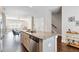 Kitchen island featuring granite countertops, stainless steel appliances and adjacent to the dining area at 1405 Attwater Dr, Atlanta, GA 30316
