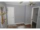Bedroom features a window, a door, and a ceiling fan at 2172 Jernigan Drive Se, Atlanta, GA 30315