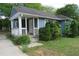 Exterior showcasing the side of the blue house and the front porch at 2172 Jernigan Drive Se, Atlanta, GA 30315