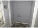 A laundry room featuring hook ups, gray walls, trim, and a single window at 2172 Jernigan Drive Se, Atlanta, GA 30315