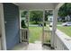 View from the covered front porch looking out at the street at 2172 Jernigan Drive Se, Atlanta, GA 30315