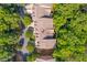 Overhead view of the townhome complex surrounded by mature trees and landscaping at 2664 Long Pointe, Johns Creek, GA 30076