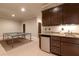 Basement area with a wet bar and space for recreation at 2664 Long Pointe, Johns Creek, GA 30076