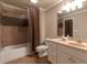 Bathroom features tile flooring, shower and bath, and vanity sink at 2664 Long Pointe, Johns Creek, GA 30076