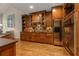 Spacious kitchen features wood floors, stainless steel appliances, and ample counter space, perfect for cooking at 2664 Long Pointe, Johns Creek, GA 30076