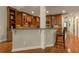 Spacious kitchen featuring custom cabinetry, granite counters, and modern appliances at 2664 Long Pointe, Johns Creek, GA 30076