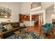 Open-concept living area features hardwood floors, neutral tones, and seamless transitions to the kitchen at 2664 Long Pointe, Johns Creek, GA 30076