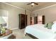 Bright main bedroom with hardwood floors, natural light, and tasteful furnishings, creating a relaxing atmosphere at 2664 Long Pointe, Johns Creek, GA 30076