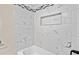 Modern bathroom showcasing a niche and clean white tiles at 3428 Quail Sw Run, Marietta, GA 30008