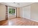 A peaceful bedroom with wood floors, ceiling fan, natural light and closet at 3428 Quail Sw Run, Marietta, GA 30008