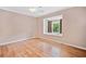 A cozy bedroom showcasing a window seat that offers a view at 3428 Quail Sw Run, Marietta, GA 30008
