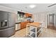 Functional kitchen with stainless steel appliances and a central island at 3428 Quail Sw Run, Marietta, GA 30008