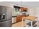 Bright kitchen featuring updated appliances and a convenient center island at 3428 Quail Sw Run, Marietta, GA 30008