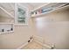 Functional utility room with a window, shelving and hookups at 3428 Quail Sw Run, Marietta, GA 30008