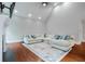 Bright living room featuring hardwood floors, recessed lighting, and a comfortable, sectional couch at 1000 Admiral Xing, Alpharetta, GA 30005