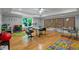 Bright playroom with hardwood floors, large windows, and colorful decor perfect for activities and learning at 1000 Admiral Xing, Alpharetta, GA 30005