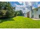 Large backyard with lots of green grass at 1013 Odelle Cir, Mcdonough, GA 30253