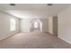 Bright bonus room featuring neutral walls, carpet and a ceiling fan at 1013 Odelle Cir, Mcdonough, GA 30253