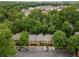 A bird's eye view of townhomes with private parking nestled within a vibrant, green neighborhood at 1105 Clairemont Ave # O, Decatur, GA 30030