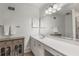 Bathroom with a large mirror, white countertop, and ample storage at 1105 Clairemont Ave # O, Decatur, GA 30030