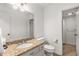 Well-lit bathroom featuring granite countertops and a bright, clean aesthetic at 1105 Clairemont Ave # O, Decatur, GA 30030