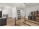 Bedroom with hardwood floors, ceiling fan, and versatile layout at 1105 Clairemont Ave # O, Decatur, GA 30030