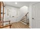 Inviting entryway with hardwood floors and staircase leading to the upper level at 1105 Clairemont Ave # O, Decatur, GA 30030