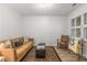 Cozy living room featuring comfortable seating, warm tones, and inviting décor at 1105 Clairemont Ave # O, Decatur, GA 30030