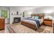 Comfortable bedroom with a fireplace, windows, and a relaxing atmosphere at 1105 Clairemont Ave # O, Decatur, GA 30030