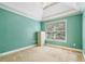Bright bedroom features trey ceiling, neutral carpet, and ample closet space at 1210 Magnolia Park Cir, Cumming, GA 30040