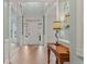 Inviting foyer with hardwood floors, high ceilings, and elegant trim details at 1210 Magnolia Park Cir, Cumming, GA 30040