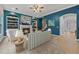 Living room with fireplace, built-in shelving, and view to the entry at 1210 Magnolia Park Cir, Cumming, GA 30040
