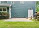 Spacious patio offering an ideal outdoor space, complimented by lush greenery and garden accents at 1210 Magnolia Park Cir, Cumming, GA 30040