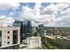 Stunning aerial view showcasing city buildings and lush green surroundings at 1280 W Peachtree Nw St # 3602, Atlanta, GA 30309