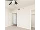 Clean bedroom showcasing neutral tones and an open door to a walk-in closet at 1280 W Peachtree Nw St # 3602, Atlanta, GA 30309