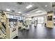 Well-equipped fitness center with modern machines and large windows at 1280 W Peachtree Nw St # 3602, Atlanta, GA 30309