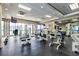 Modern gym with a variety of exercise machines and mirrored walls at 1280 W Peachtree Nw St # 3602, Atlanta, GA 30309