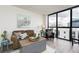 Inviting living room featuring sleek wood floors, comfortable seating, and a bright, open atmosphere at 1280 W Peachtree Nw St # 3602, Atlanta, GA 30309