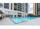 Beautiful outdoor pool with lounge chairs for relaxing in the sun at 1280 W Peachtree Nw St # 3602, Atlanta, GA 30309