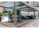 Poolside lounge area with comfortable seating and views of the city skyline, perfect for relaxation at 1280 W Peachtree Nw St # 3602, Atlanta, GA 30309