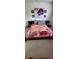 Comfortable bedroom with a decorative floral patterned bedspread at 4520 Essen Lane, Cumming, GA 30041