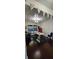 Dining area featuring hardwood floors and a decorative ceiling at 4520 Essen Lane, Cumming, GA 30041