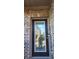 Stunning leaded-glass front door set in brick entryway of home at 4520 Essen Lane, Cumming, GA 30041
